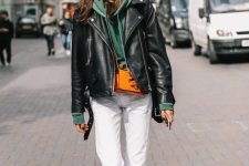 14 a green hoodie, white jeans, black sneakers and a black leather jacket for a cool fall look