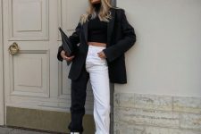16 a black cropped top, two tone pants, a black blazer, white boots and a black clutch are great and contrasting