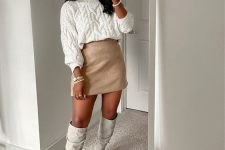 19 a neutral fall outfit with a white patterned jumper, a tan mini skirt, white knee boots and lovely pearl bracelets