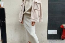 21 a pretty neutral outfit with a ribbed turtleneck, a creamy pencil skirt, white bootties and a neutral teddy jacket