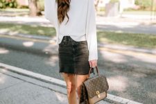 23 a white jumper, a black denim mini, white booties, a brown printed bag and a brown hat are great for the fall