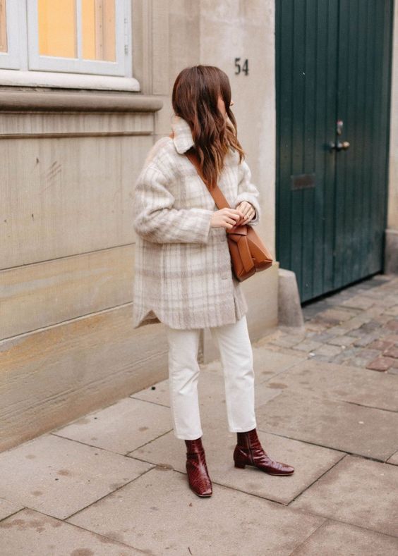 white jeans, a plaid shirt jacket, burgundy boots and a rust colored bag are a great combo for the fall