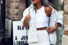 35 a total white look with a crop top, a pencil skirt, a white oversized denim jacket and a black bag