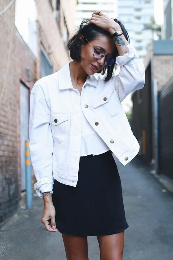 a white crop top, a black mini skirt, a white denim jacket for a non boring black and white look