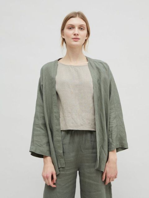 With light gray loose shirt and olive green linen loose pants