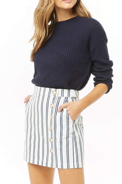 With navy blue sweater
