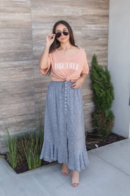 With pale pink loose t-shirt, sunglasses and beige high heels