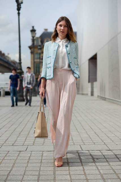With white button down shirt, light blue collarless blazer, beige leather tote bag and beige leather heeled shoes