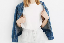 With white loose t-shirt and blue denim jacket