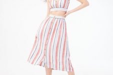 With white, pink and blue striped crop top and white flat shoes