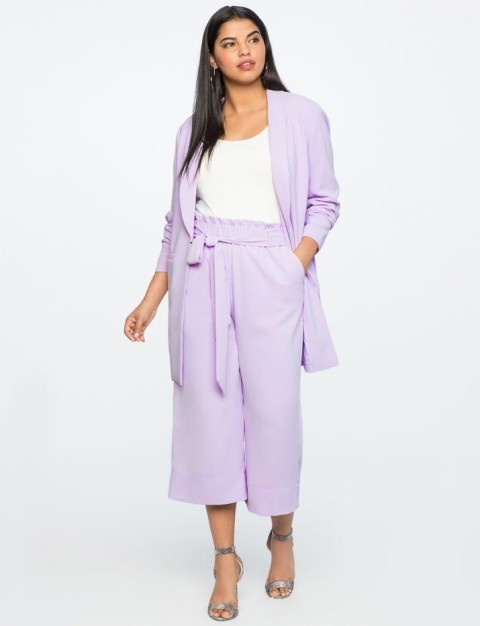 With white top, lilac long blazer and silver ankle strap shoes