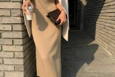 a beige ribbed midi dress, a creamy blazer, white trainers and a brown clutch are a lovely combo for this fall