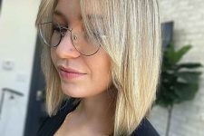 a blonde A-line long bob with curtain bangs is a lovely and cute idea with a classic hair color but a twist with its angle