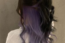 a bold peekaboo hairstyle with black and lilac locks and waves is a fun and lovely idea for making a statement
