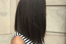 a chic black A-line long bob is always a good idea, give it a bit of volume and highlight this sloped line
