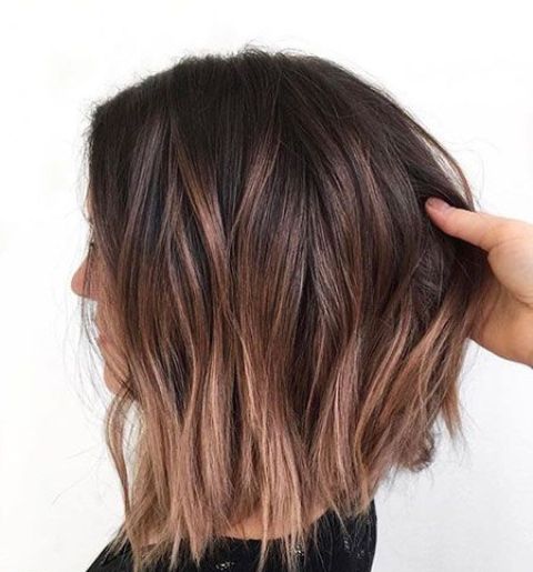 a dark brown, almost black bob with copper balayage is a beautiful idea with a gorgeous color touch