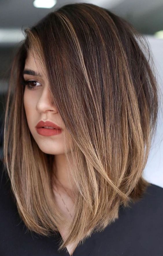 a jaw-dropping dark brown A-line long bob with caramel balayage and lowlights and much volume is a fantastic idea