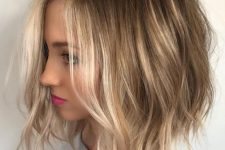 a light brown bob with blonde balayage and messy waves and texture is a lovely idea to rock