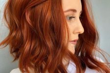 a long angled copper red bob with much volume and waves is a fantastic idea to rock this fall, it wows