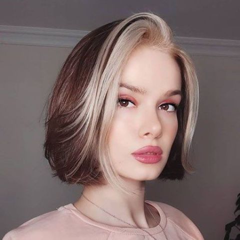 a short bold brunette bob with icy blonde money piece is a gorgeous idea for a bold look