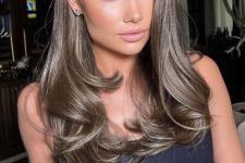 beautiful long mousy brown hair with a touch of shine and messy waves is a lovely idea to look chic