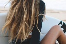 long dark brown hair with sunkissed beach blonde highlights and a truly beach texture is a beautiful idea