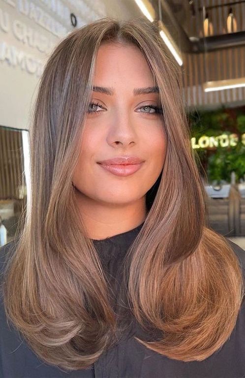 long mousy brown hair with blonde babylights and a bit of volume is a lovely idea for a modern and fresh look