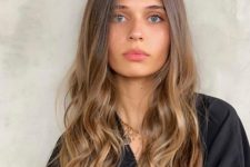 nothing jazzes up light brown roots like a golden wash of balayage color from midway down to the ends