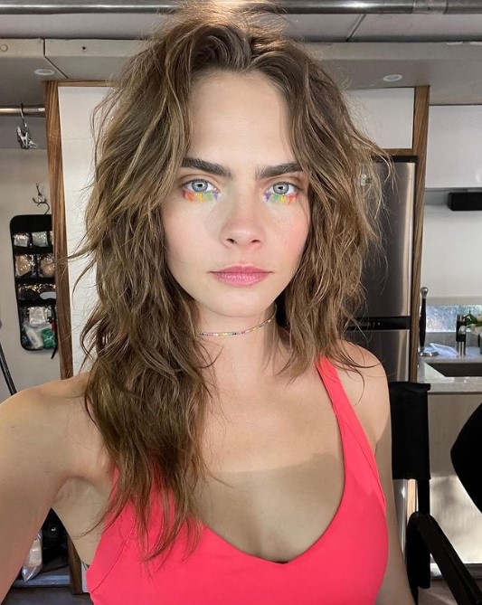 supermodel Cara Delevingne ditched her signature bright blonde for a neutral brunette, which is mousy brown
