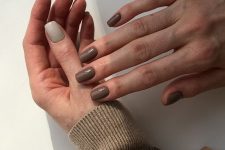 02 a beautiful and delicate fall manicure with light grey left hand nails and dark grey right hand nails is adorable