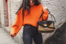04 a bold orange jumper, black skinnies, brown cowboy boots, a two-tone bag for the fall