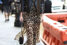 04 a leopard print maxi skirt, a black leather jacket, black boots and a black bag with chain are a lovely fall combo