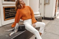 04 an elegant fall work outfit with an orange turtleneck sweater, white jeans, a black bag, two-tone shoes is lovely