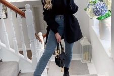 06 a black turtleneck, blue skinnies, an oversized black blazer, black chunky boots and a small saddle bag