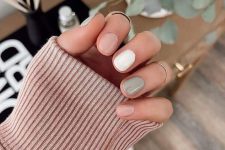 07 a delicate and neutral autumn manicure in light green, blush and white is a lovely idea of a mismatching manicure
