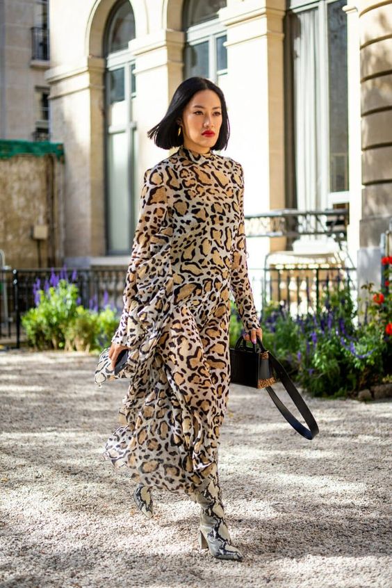 a gorgeous fall outfit with a leopard print midi dress, snakeskin boots, a black bag and a red lip is wow