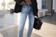 07 a relaxed and cozy fall work outfit with a taupe hoodie, a black blazer, light blue jeans, black high top sneakers and a black tote