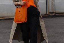 08 a comfortable casual look with an orange jumper, black trousers, a neutral trench, an orange tote and white sneakers