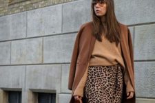 09 a beige turtleneck, a leopard printed midi, a brown coat, black boots and an amber bag for the fall and winter