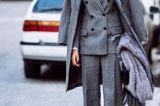 10 a lovely fall to winter work outfit with a black turtleneck, a grey pantsuit, a matching coat and a scarf