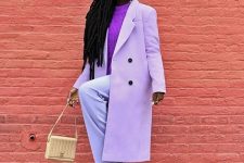 12 a classy pastel outfit with lilac pants and a trench, a purple sweater, pale lilac boots and a neutral bag
