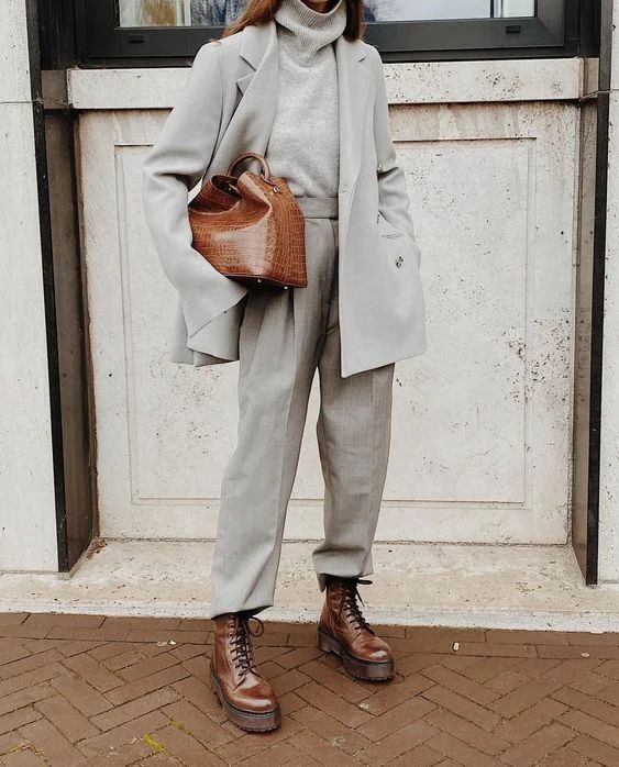 a minimalist fall look with a dove grey pantsuit, a matching turtleneck, brown boots and a matching bag is chic