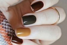 12 a super bold fall-colored mismatching manicure like this one will definitely catch all the eyes and make your look bolder and lovelier