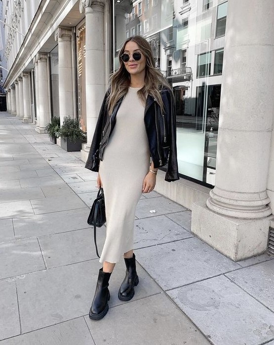 a neutral midi dress, black Chelsea boots, a black leather jacket and a black bag for a minimal and chic look