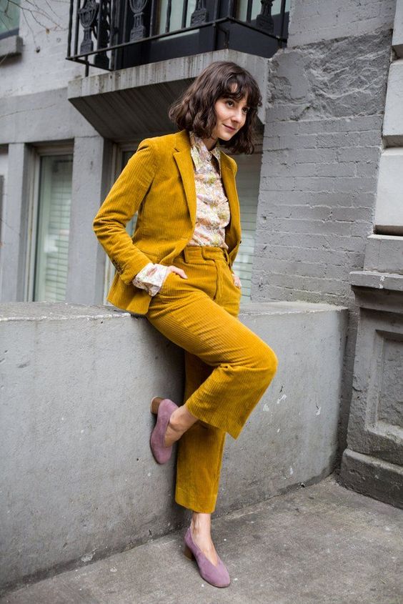 an elegant retro work outfit with a printed shirt, a mustard corduroy pantsuit, pink suede shoes is a cool idea