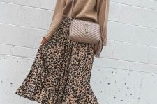 16 a simple and cute fall outfit with a tan sweater, a leopard print midi, nude booties and a nude bag is very girlish
