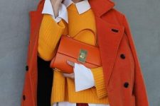 17 a bold fall work look with a white shirt, a yellow jumper, red leather pants, an orange coat and an orange bag