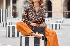21 a leopard print blouse, mellow yellow pants, two tone slingbacks and a black pritned bag for an elegant fall look
