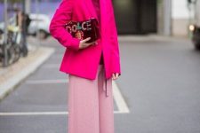 23 a burgundy turtleneck, a hot pink blazer, light pink trousers and heels, a burgundy velvet bag