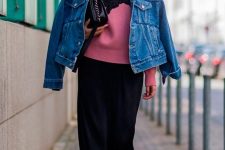30 a black midi skirt, black strappy shoes, a pink printed jumper, a blue denim jacket and a black bag for a bright look